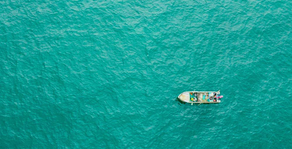 A photo of a boat at the sea