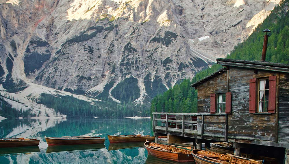 Discover the enchanting Braies Lake in spring, a breathtaking natural wonder that epitomizes the beauty and serenity of the season, perfect for exploration and awe-inspiring experiences.