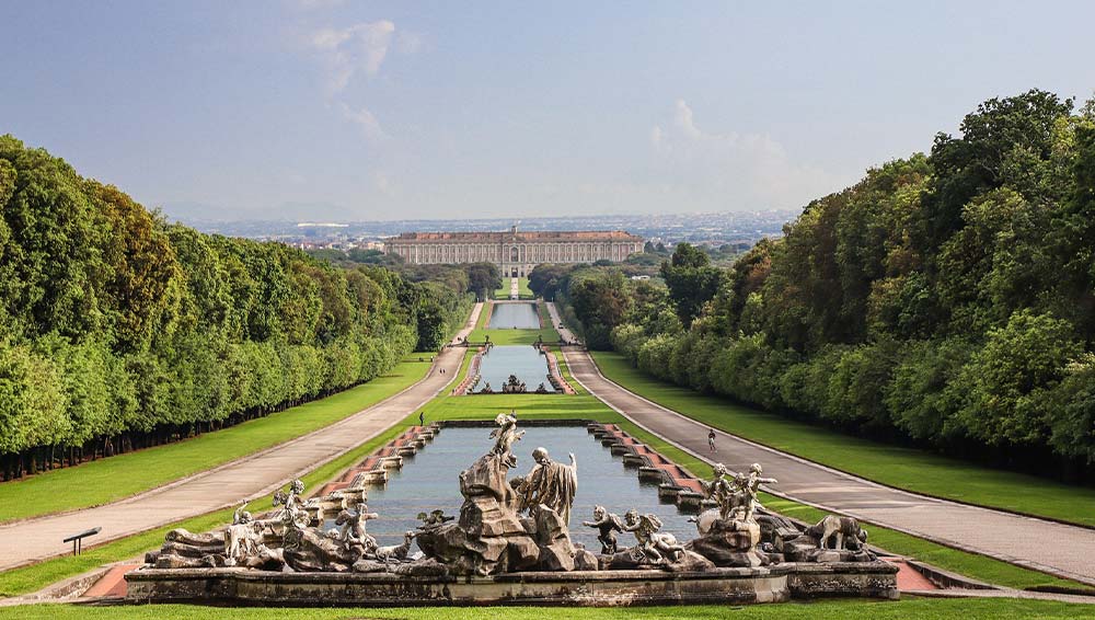 Explore the majestic Royal Gardens at the Palace of Caserta, a stunning destination offering royal grandeur and natural beauty, ideal for discovery during the spring season.