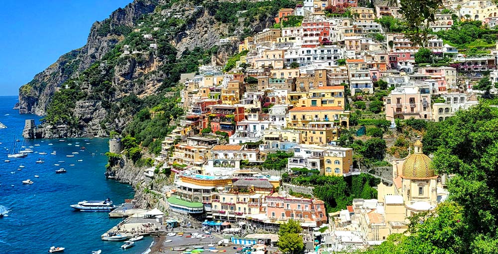 a photo of some beautiful houses in Positano’s colorful, Italy.