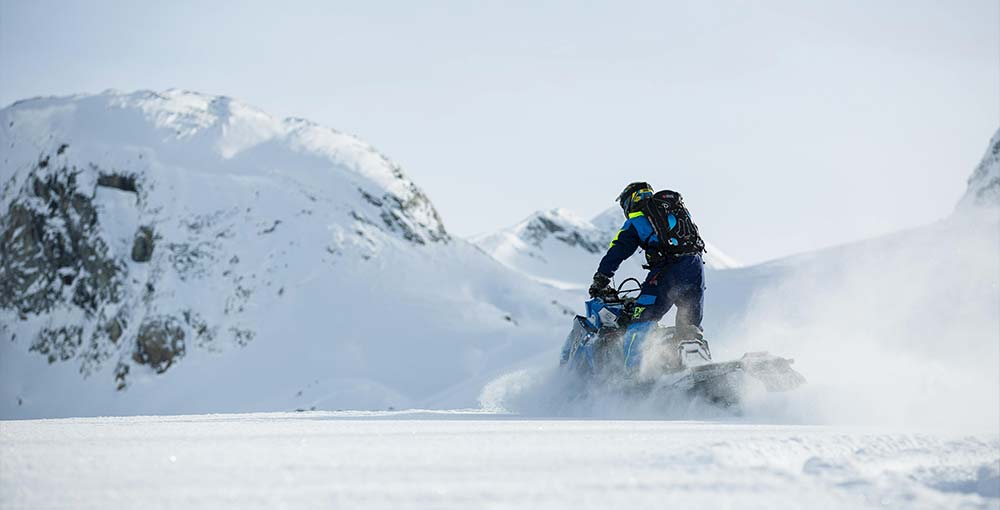 Join a Guided Snowmobile Excursion: Allow Experts to Lead the Way Safely