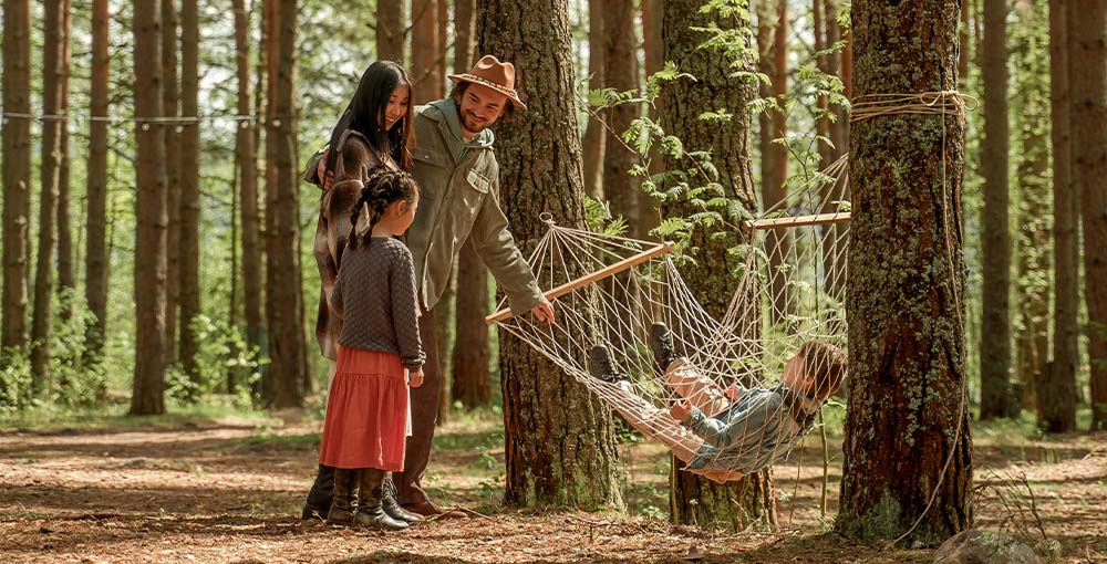 family having outdoors fun at the forest