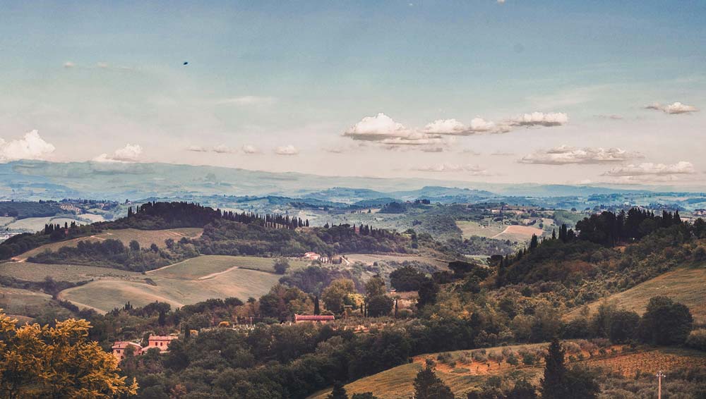 Explore the enchanting beauty of Tuscany in spring, where rolling hills, blooming flowers, and charming villages create a picturesque backdrop for unforgettable adventures and cherished memories.