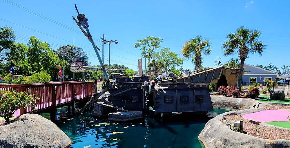 Enjoy a round of miniature golf fun at Shipwreck Point Golf!