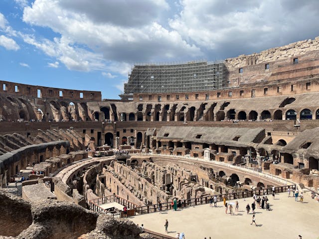 Inside the Colosseum with ancient ruins and columns